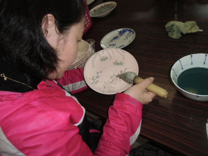 Pottery Student painting